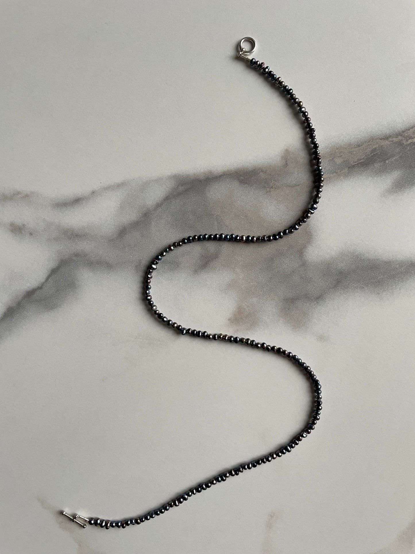 Simple freshwater peacock pearls
